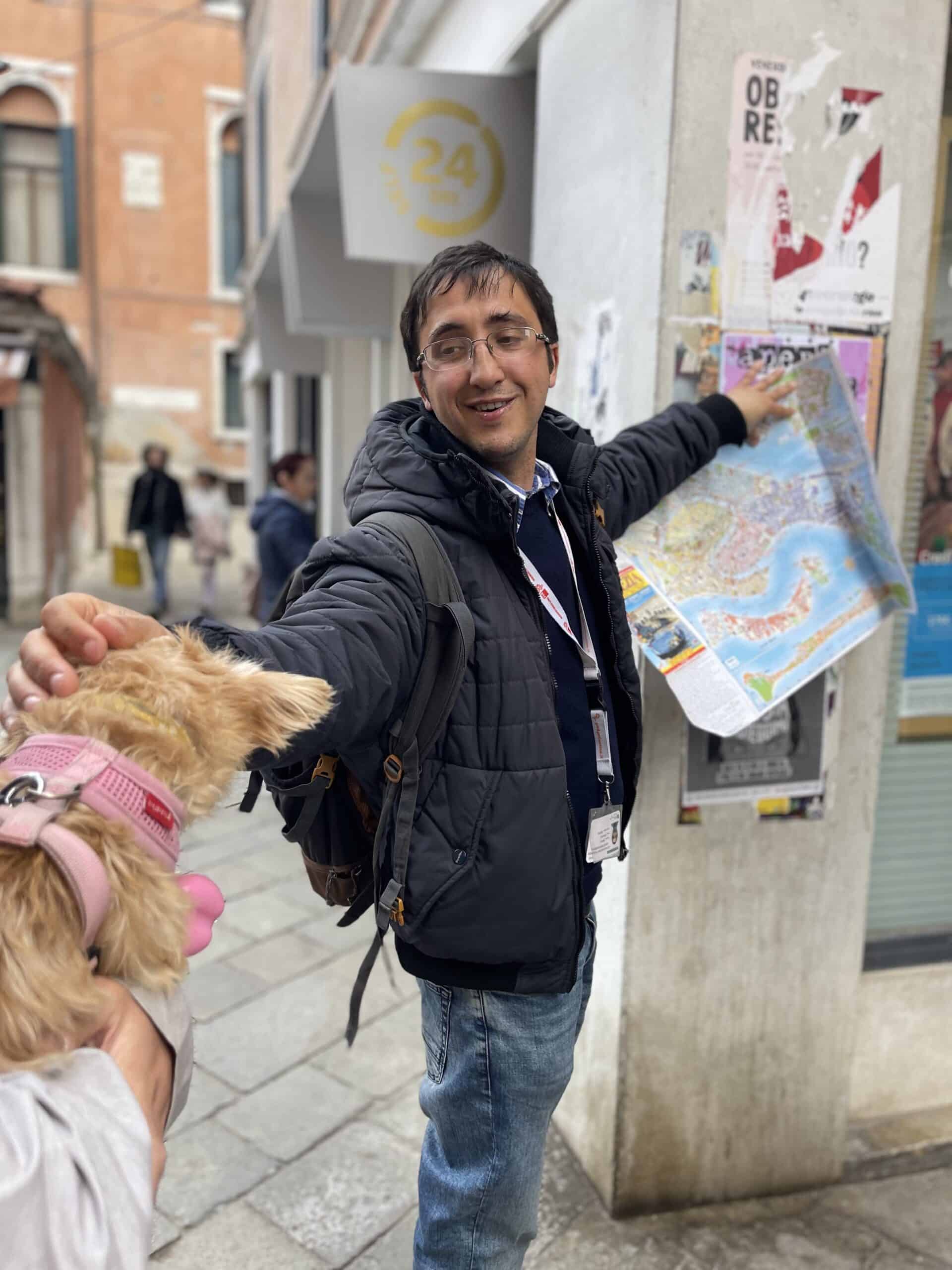 Pup Sheila getting pets from our walking tour guide as we traveled through Venice Italy