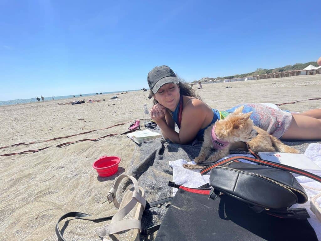 Small dog travel accessories: Sheila and I enjoying the beach in Italy