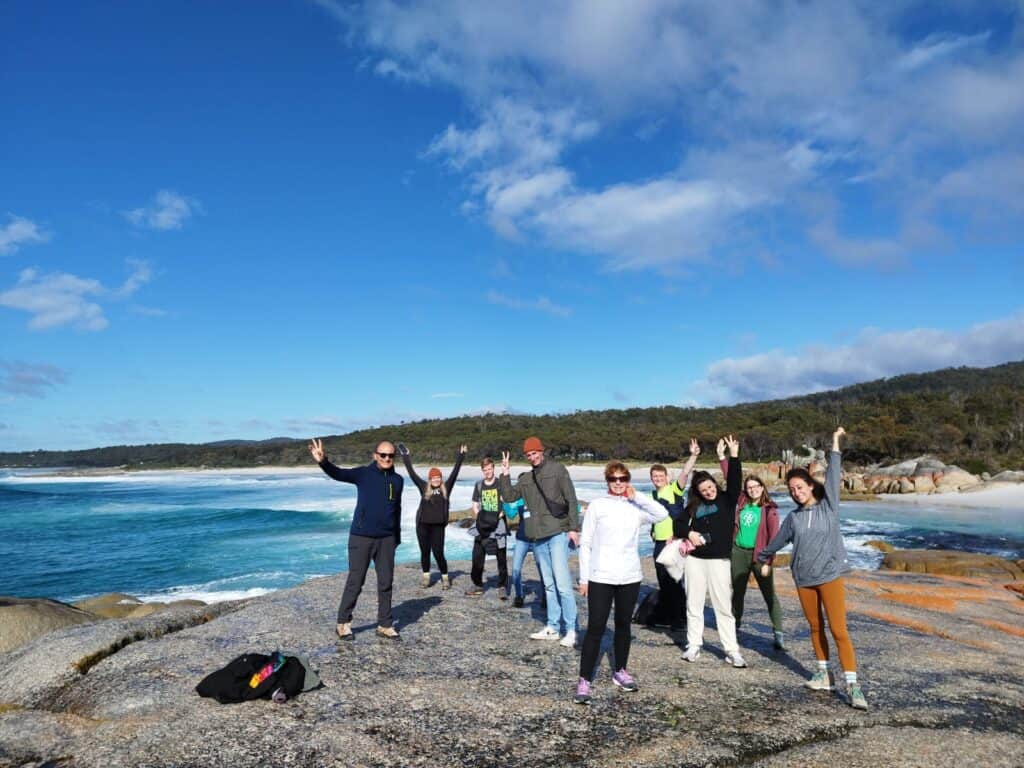 Our group enjoying the Bay of Fire in Under Down Under Tours.