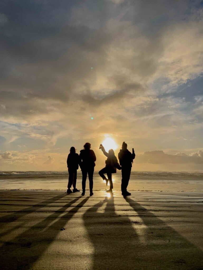 Group on the West Coast of Tasmania enjoying the Sunset